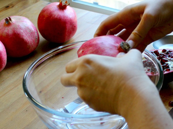 Deseed a Pomegranate in 5 minutes or less - step 3 - stretch gently to loosen membrane