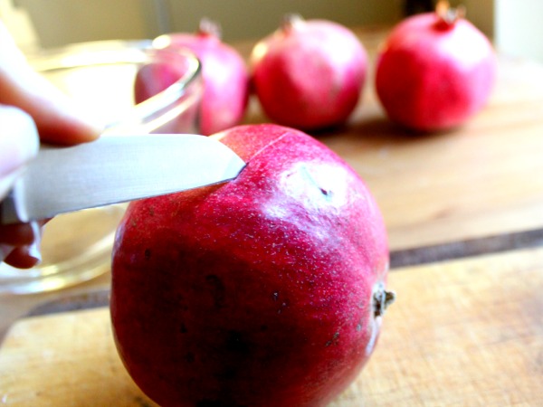 De-seed a pomegranate in 5 minutes or less- step 1 score the skin