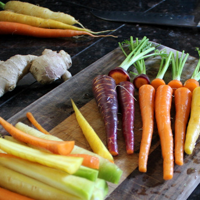 Carrots being cut for dilly carrot sticks