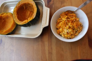 Scooping out winter squash seeds