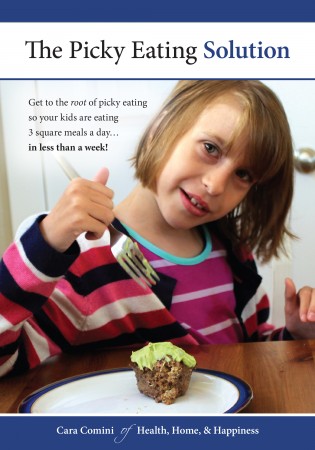 Image for The Picky Eating Solution: A 10-year-old girl with sensory issues enjoying meat and avocado. She's smiling and wearing a pink sweater. 