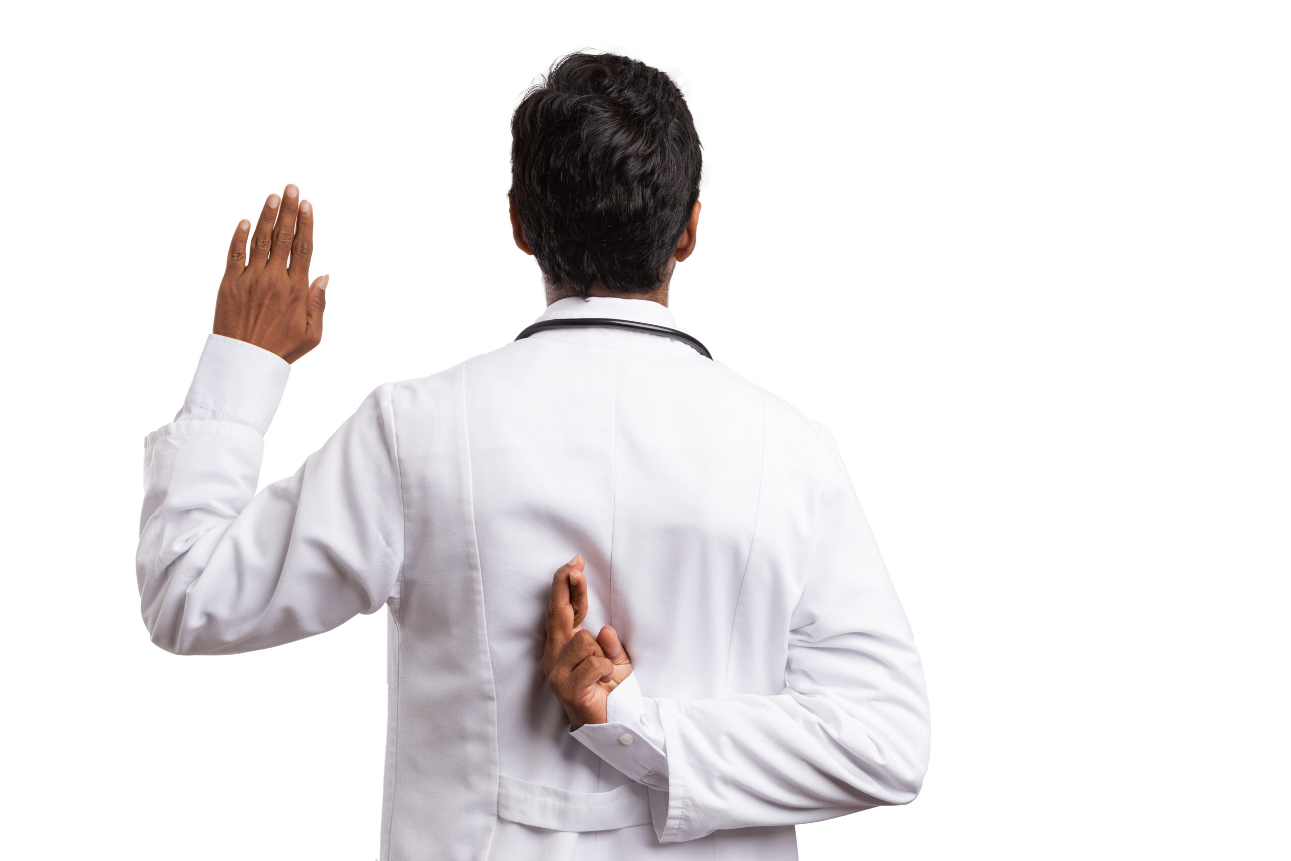 Doctor taking an oath with fingers crossed behind his back